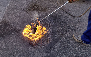 Wall Under Heywood flat roofing repairs